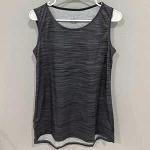 Charcoal gray sleeveless shirt.